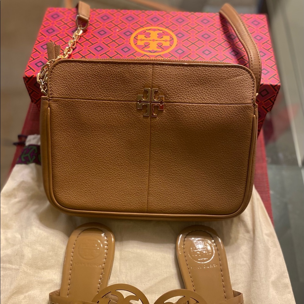 Like new Tory Burch tan camera bag.